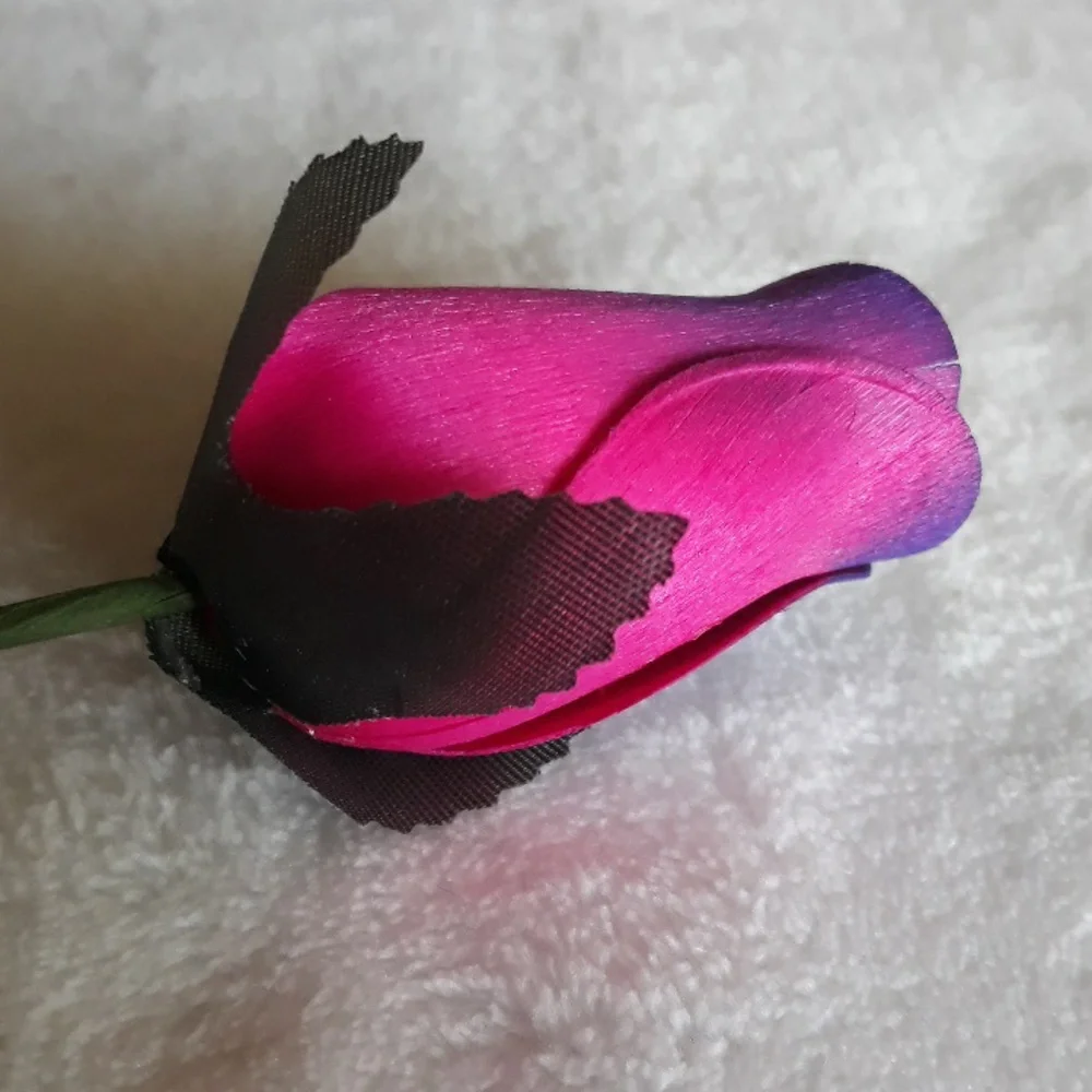 Wooden rose, pink and purple. 13 inches long.